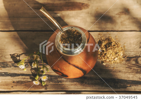 Argentinean yerba mate drink with chamomile flower 37049545
