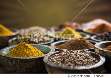 Spices on wooden bowl background 37050389