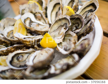 oysters with lemon oysters with lemon 37056168
