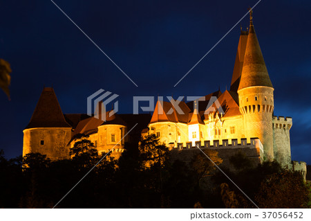 Night landscape with illuminated Corvin Castle, Romania 37056452