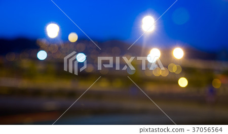 Blurred view of city highway in dusk Blurred view of city highway in dusk 37056564