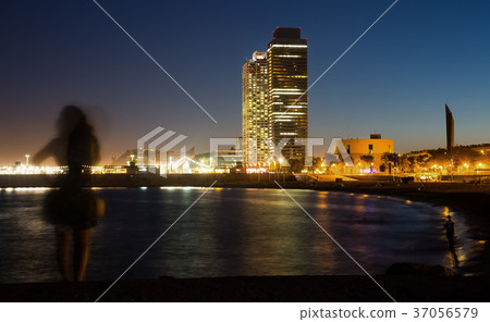 Illuminated Barceloneta Beach in summer night Illuminated Barceloneta Beach in summer night 37056579
