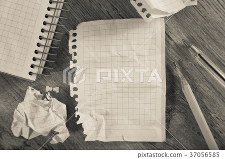 Crumpled pages and notebook Crumpled pages and notebook 37056585