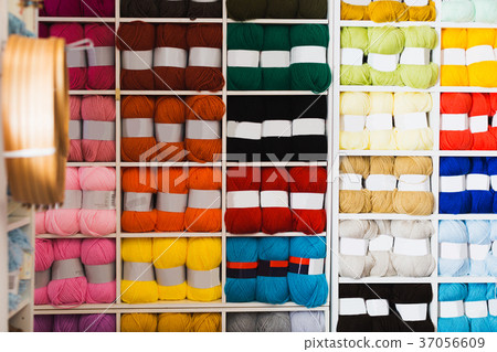 Shelves with colorful wool and yarn Shelves with colorful wool and yarn 37056609
