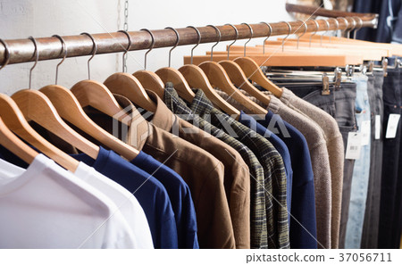 Different assortment of colorful clothing in boutique 37056711