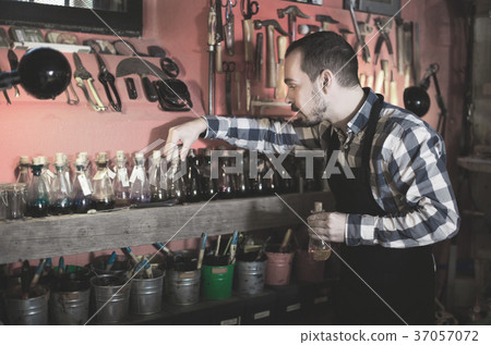 Worker choosing colorant 37057072