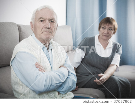 Aged couple arguing Aged couple arguing 37057902