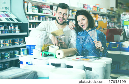 Couple buying tools for house decoration Couple buying tools for house decoration 37058199