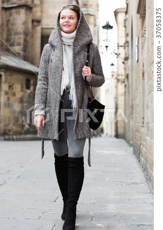 portrait of young female in hood 37058375