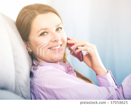 Woman using phone 37058625