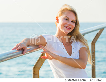 Female is posing on pirce in her free time Female is posing on pirce in her free time 37058629