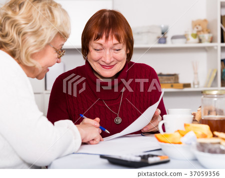 Two positive mature women with papers Two positive mature women with papers 37059356