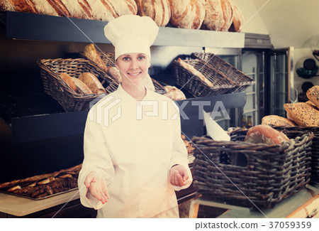 Bakery female employee with tasty Bakery female employee with tasty 37059359