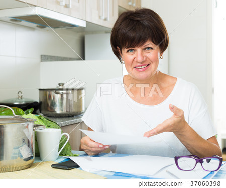 smiling woman bills 37060398
