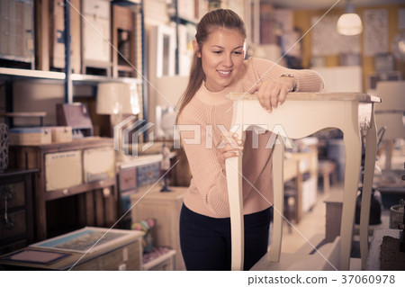 woman buyer standing near nightstand 37060978