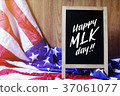 Happy MLK Day Typography on USA Flag Scene 37061077