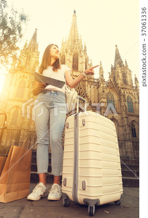 Charming traveling woman using paper map 37061336
