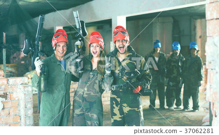 Team in red is celebrating the victory 37062281