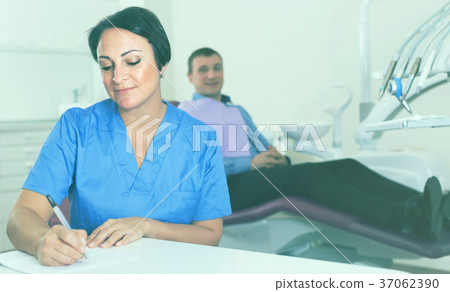 worker dentist professional sitting worker dentist professional sitting 37062390