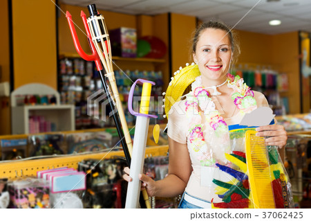 Girl holds in her hands objects for carnival 37062425