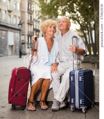 Mature spouses enjoying joint vacation Mature spouses enjoying joint vacation 37062636