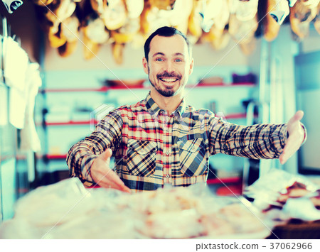 Seller offering sorts of meat 37062966