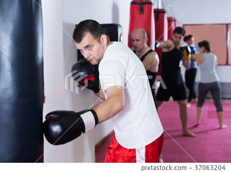 male exercise in boxing gloves male exercise in boxing gloves 37063204