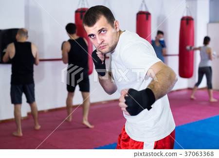 Sportsman is practicing different kiks Sportsman is practicing different kiks 37063368