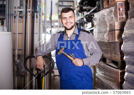 Builder showing his working tools 37063665