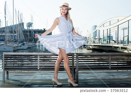 Cheerful woman in the hat 37063812
