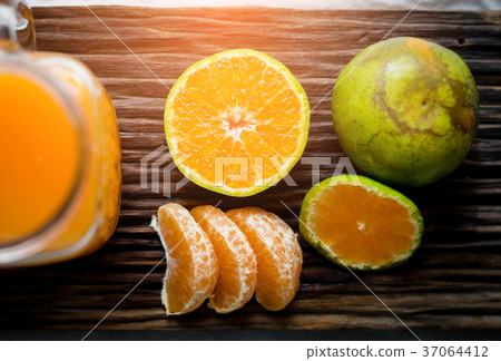 orange juice with blurry background orange juice with blurry background 37064412