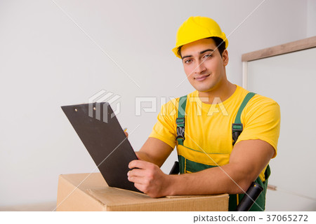 Man delivering boxes during house move Man delivering boxes during house move 37065272