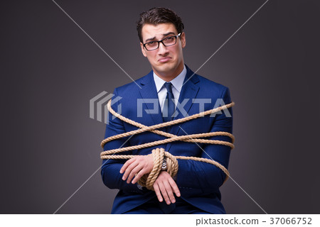 Businessman tied up with rope 37066752