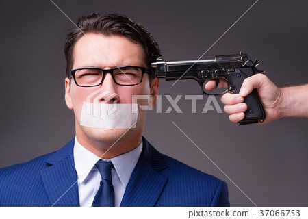 Businessman taken hostage and tied up with rope Businessman taken hostage and tied up with rope 37066753