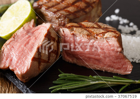 filet mignon steak with lime and rosemary macro filet mignon steak with lime and rosemary macro 37067519