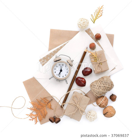 Autumn background with pencils and an alarm clock Autumn background with pencils and an alarm clock 37069837