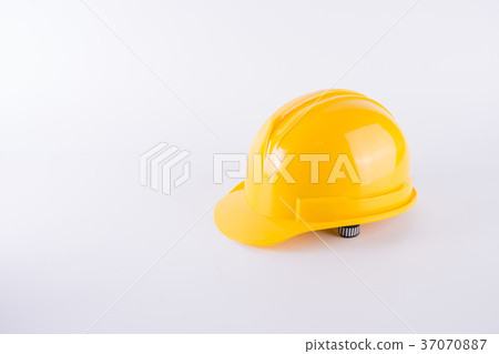 Yellow safety helmet on white background 37070887