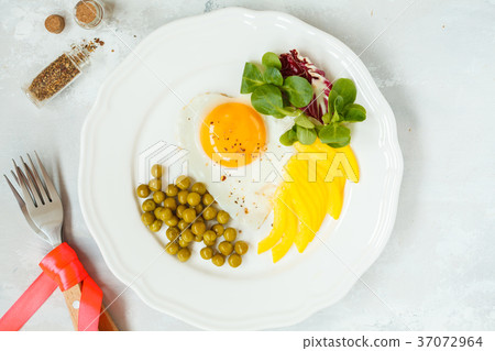 Breakfast for Valentine's Day. Fried egg heart Breakfast for Valentine's Day. Fried egg heart 37072964