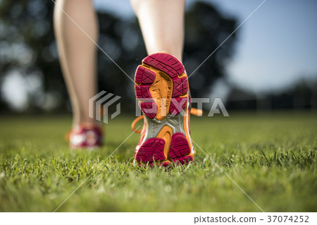 Close up of feet of a runner, training concept Close up of feet of a runner, training concept 37074252