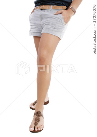 Woman legs with hot pants on white background 37076076