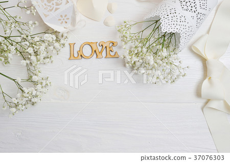 Mock up Composition of white flowers rustic style Mock up Composition of white flowers rustic style 37076303