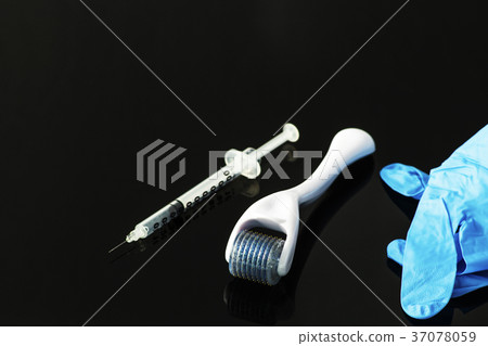 Dermaroller for medical micro needling therapy. To Dermaroller for medical micro needling therapy. To 37078059