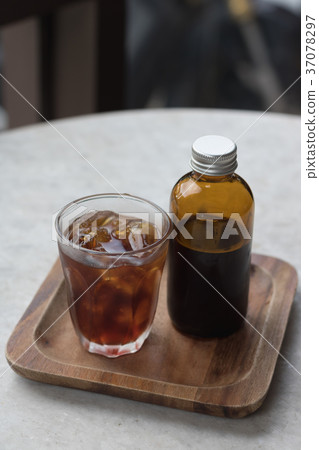 Coffee cold brew in brown bottle Coffee cold brew in brown bottle 37078297