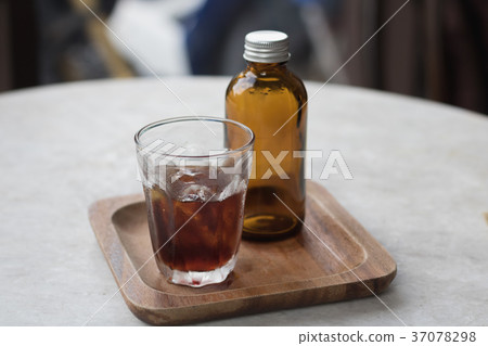 Coffee cold brew in brown bottle 37078298