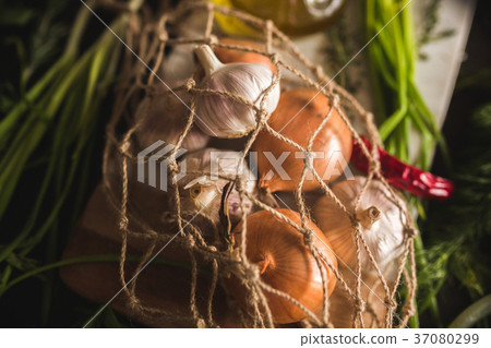 Raw Garlic, onion, dill and parsley for soup for 37080299