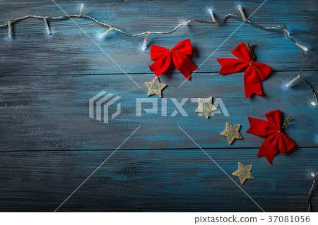 Blue wooden background and Christmas decorations. Blue wooden background and Christmas decorations. 37081056