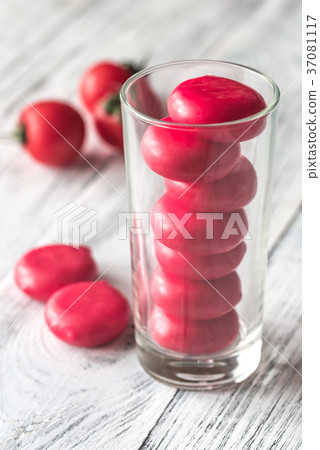 Stack of mini cheese in the glass Stack of mini cheese in the glass 37081117