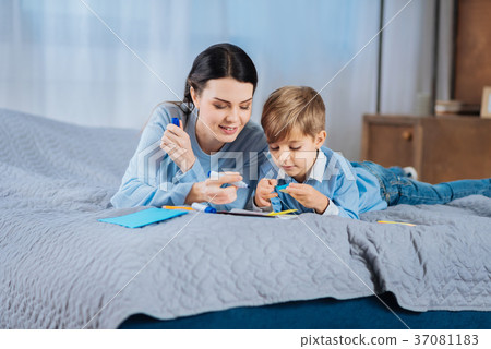 Inspired mother and son organizing notes 37081183