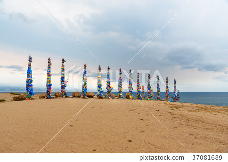Ritual pillars with colorful ribbons Olkhon Island Ritual pillars with colorful ribbons Olkhon Island 37081689