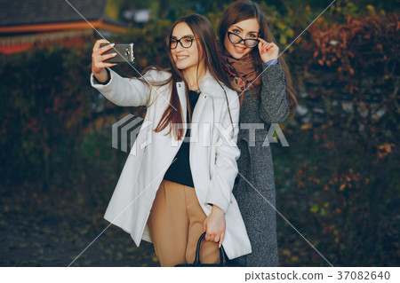 Two beautiful sisters Two beautiful sisters 37082640